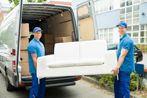 Moving team reviewing a complaint form during a removals dispute