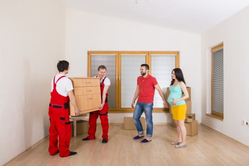 Flat removals in Haringey with moving van outside apartment block