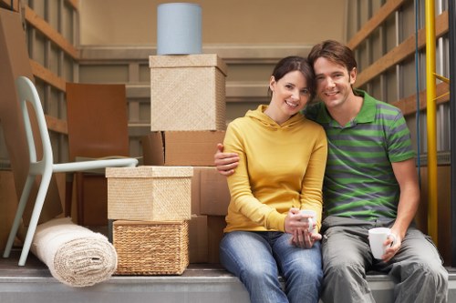 Organised moving boxes and labeled household items for relocation