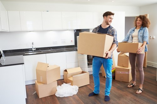 Commercial office move preparation with labelled boxes and IT equipment