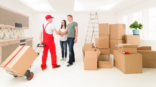 Packed boxes and moving equipment inside a removal van