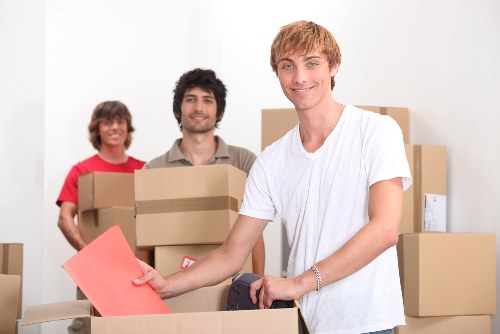 Team handling moving equipment during a scheduled removal